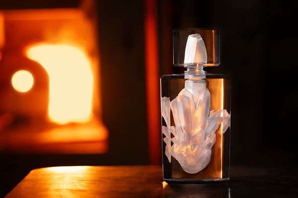 A sculptural flacon for Brioni and Lalique's Dualité extrait de parfum